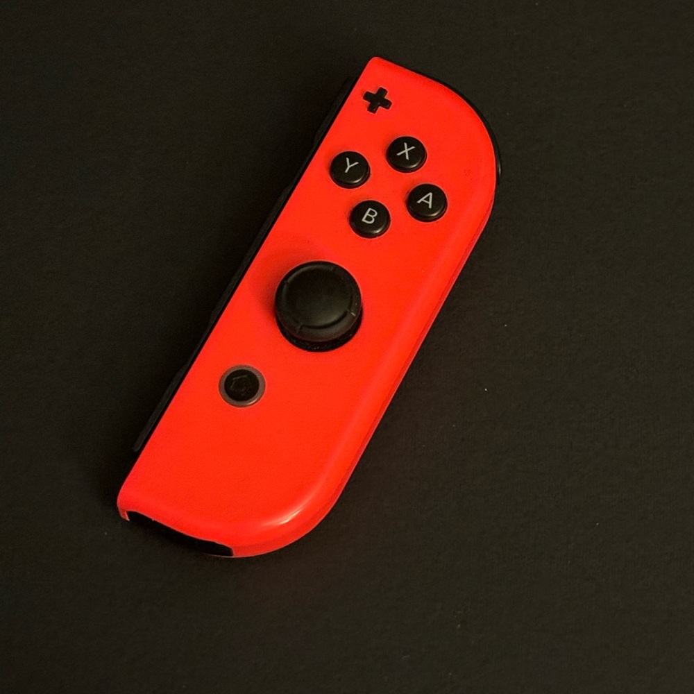 Right Nintendo switch joy con controller in red colour